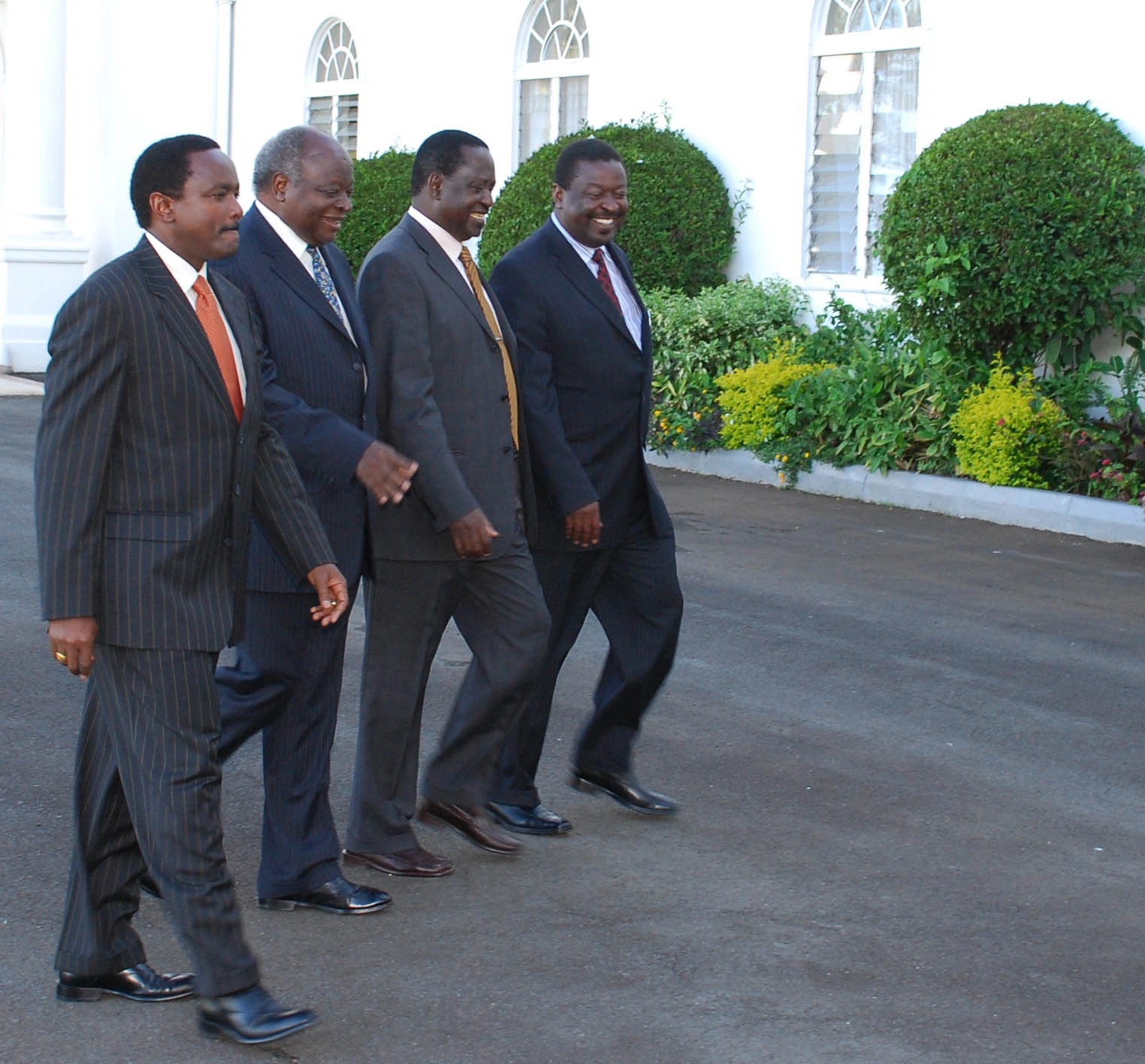 President Mwai Kibaki walking alongside VP Kalonzo Musyoka PM Raila Odinga and DPM Musalia Mudavadi at State House Nairobi
