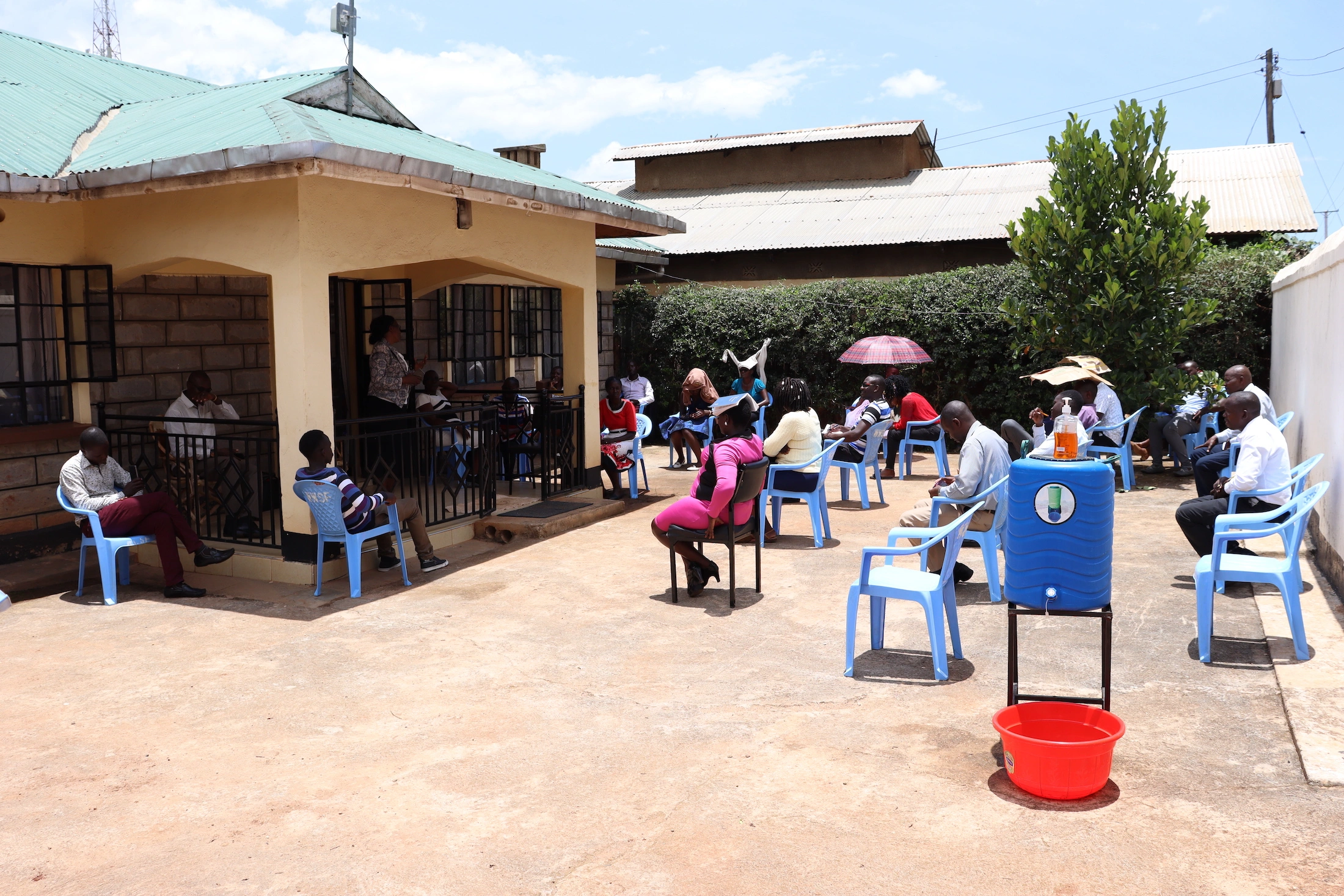 Kenya and COVID-19_Kenya Covid 19 Staff practice safe social distancing.