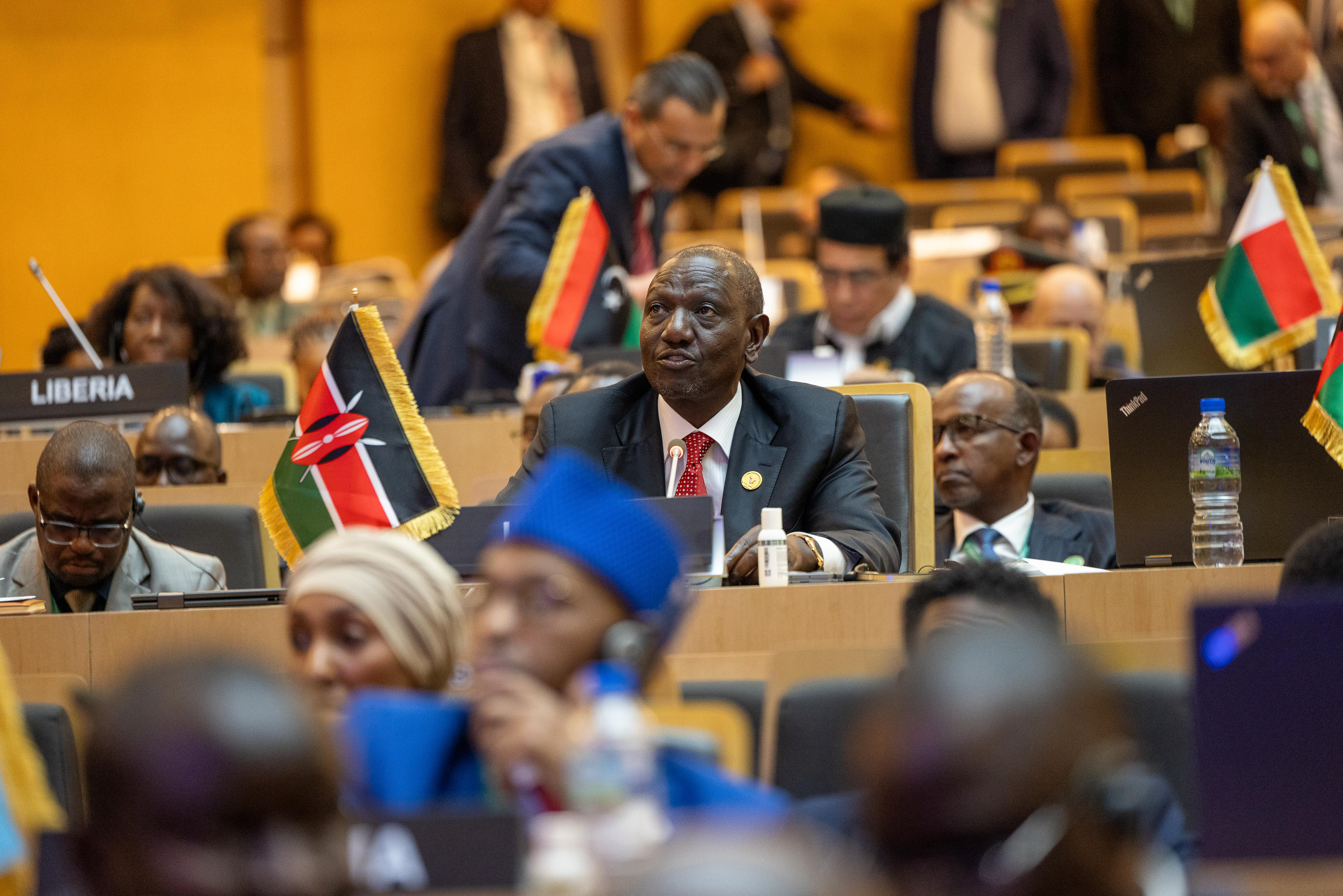 PRESIDENT WILLIAM RUTO DELIVERING REPORTS ON PEACE AND SECURITY AND AU INSTITUTIONAL REFORMS AS THE AU CHAMPION FOR INSTITUTIONAL REFORMS IN ADDIS