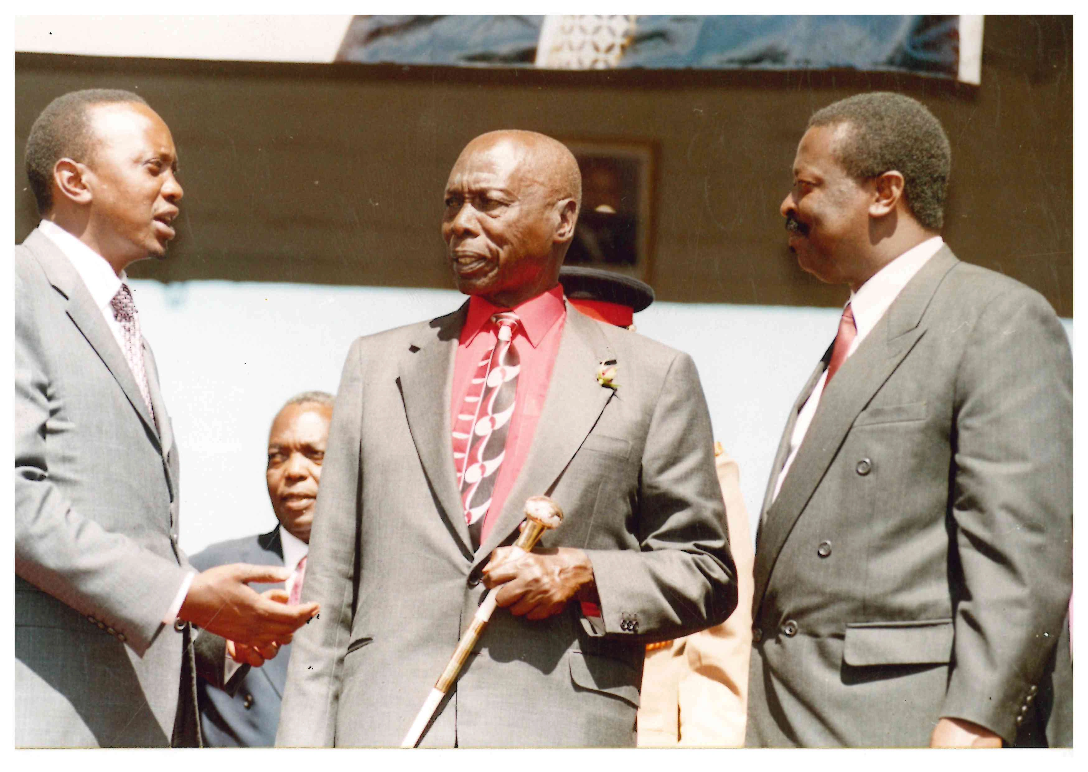 President Daniel Arap Moi and KANU presidential Candidate Uhuru Kenyatta together with VP Musalia Mudavadi at Uhuru Park Nairobi