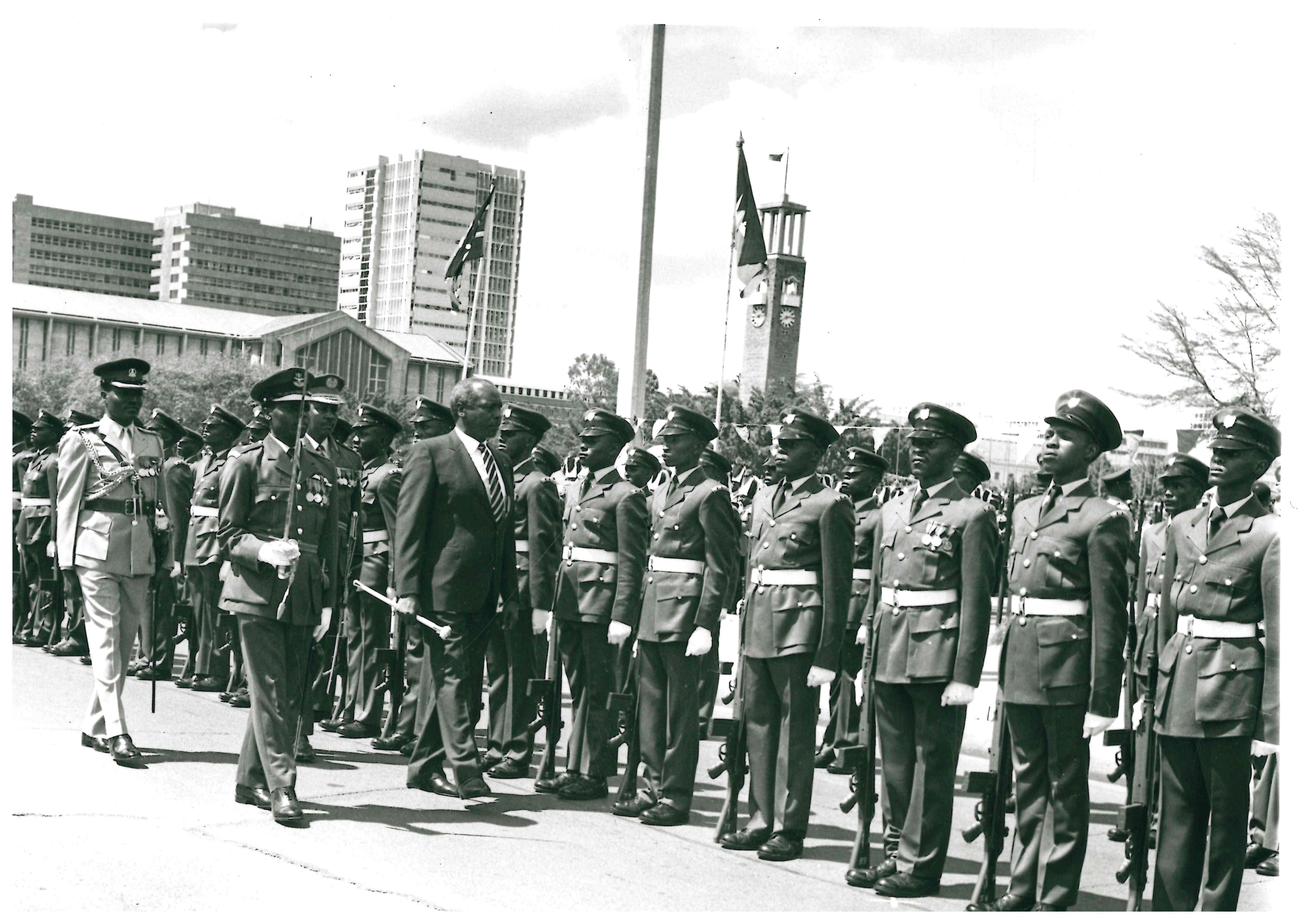 President Daniel Arap Moi inspecting a guard of honour mounted by the Kenya Military outside Parliament Buildings Nairobi.
