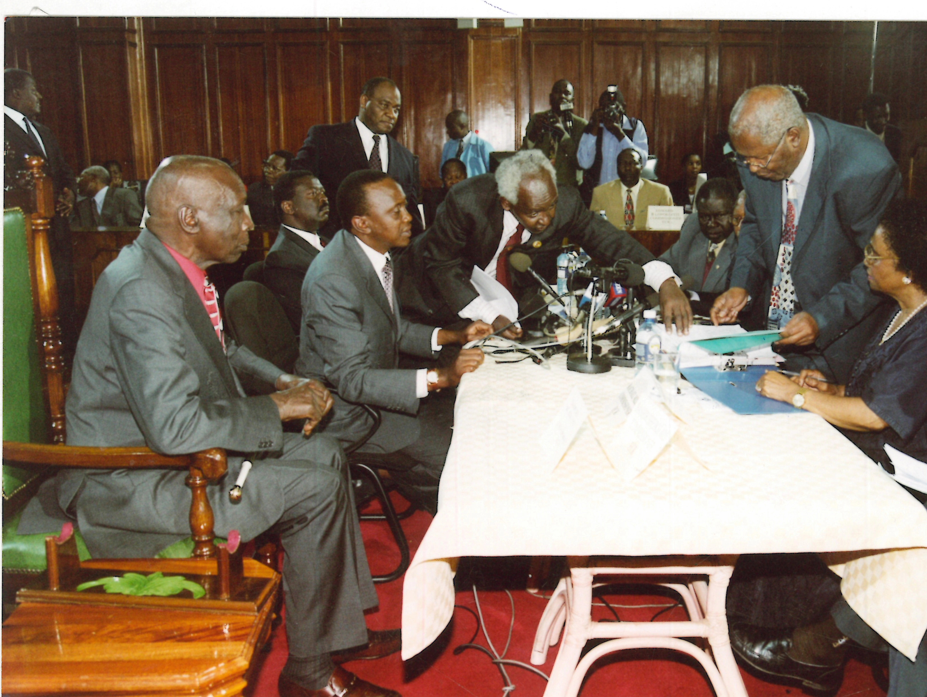 President Daniel Arap Moi with the KANU Presidential Candidate Uhuru Kenyatta presenting nomination Papers at KICC Nairobi