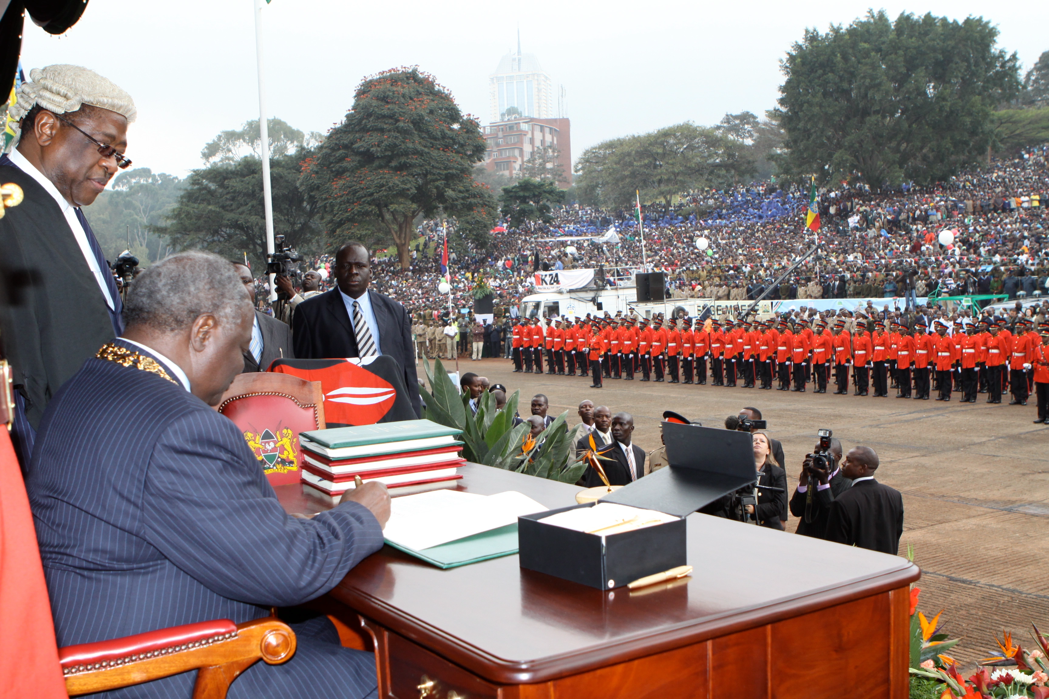 President Mwai Kibaki Signing the New Constitution on Promulgation Day at Uhuru Park Nairobi 1