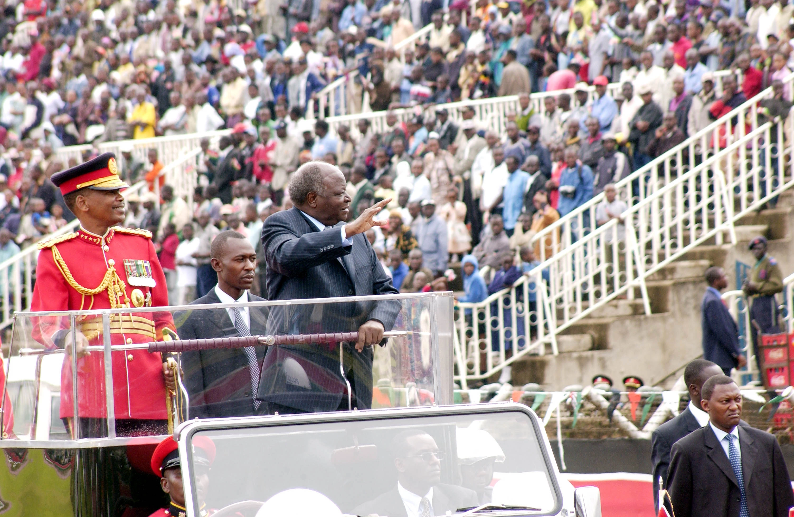 President Mwai Kibaki acknowledging greetings from Kenyans