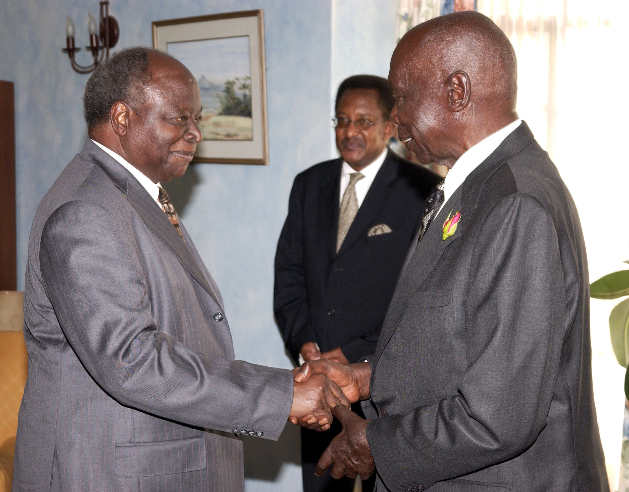 President Mwai Kibaki greeting Former President Daniel Arap Moi as Nahashon Nyagah looks on