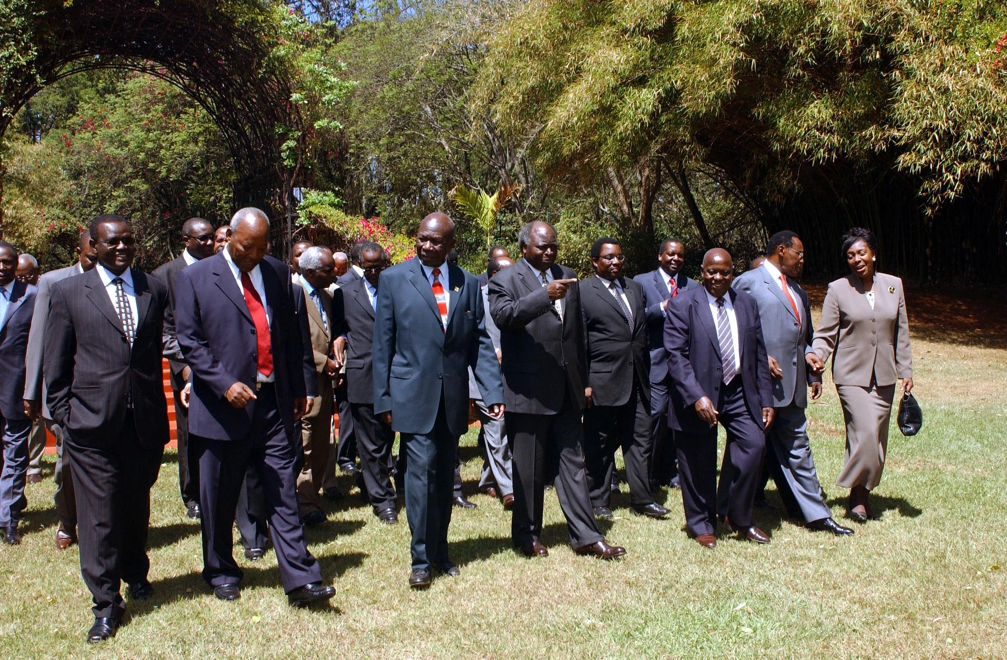 President Mwai Kibaki walking with Cabinet Ministers at State House Gardens Nairobi