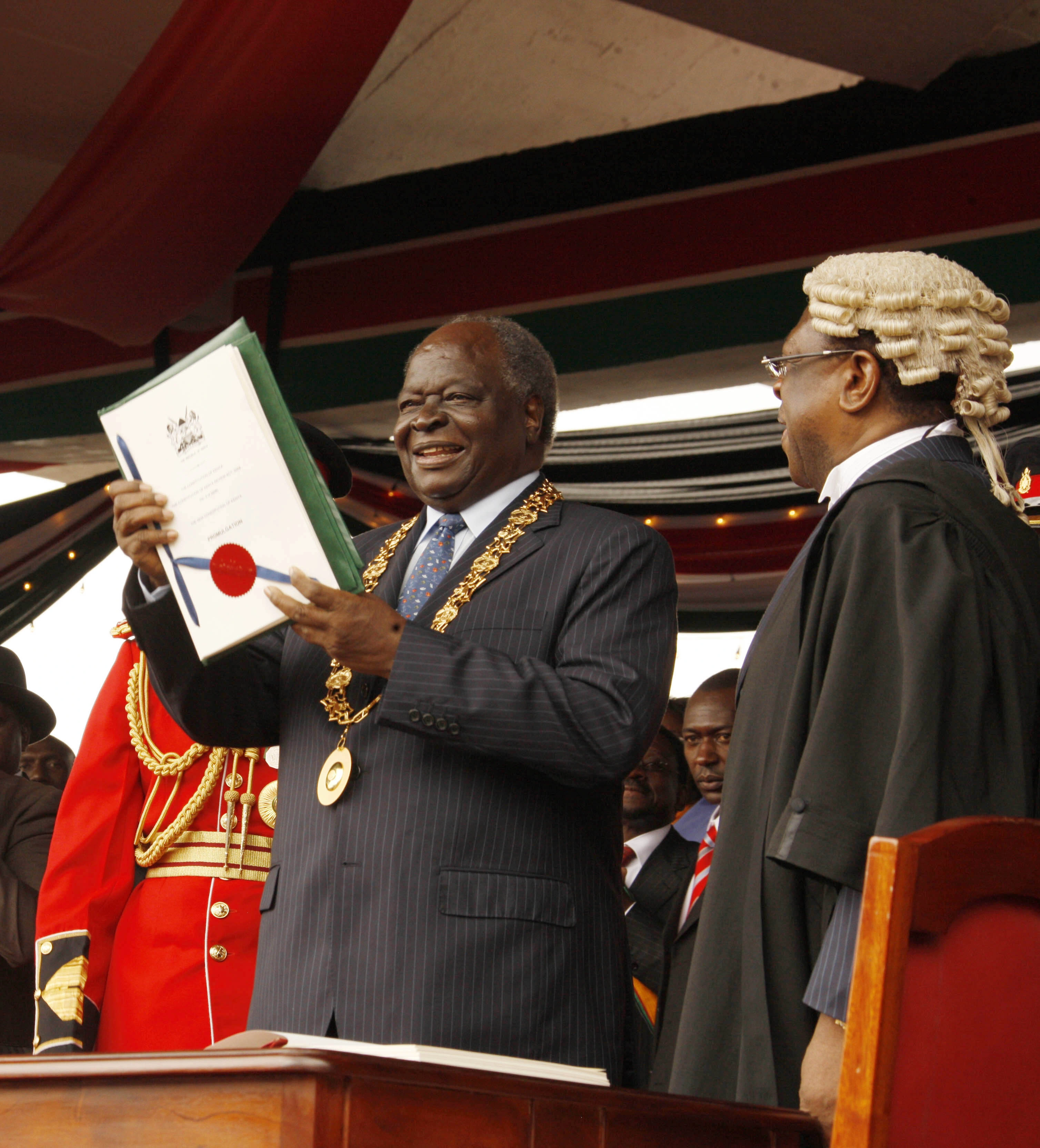 President Mwai Kibaki waving the New Constitution on Promulgation Day at Uhuru Park Nairobi 2