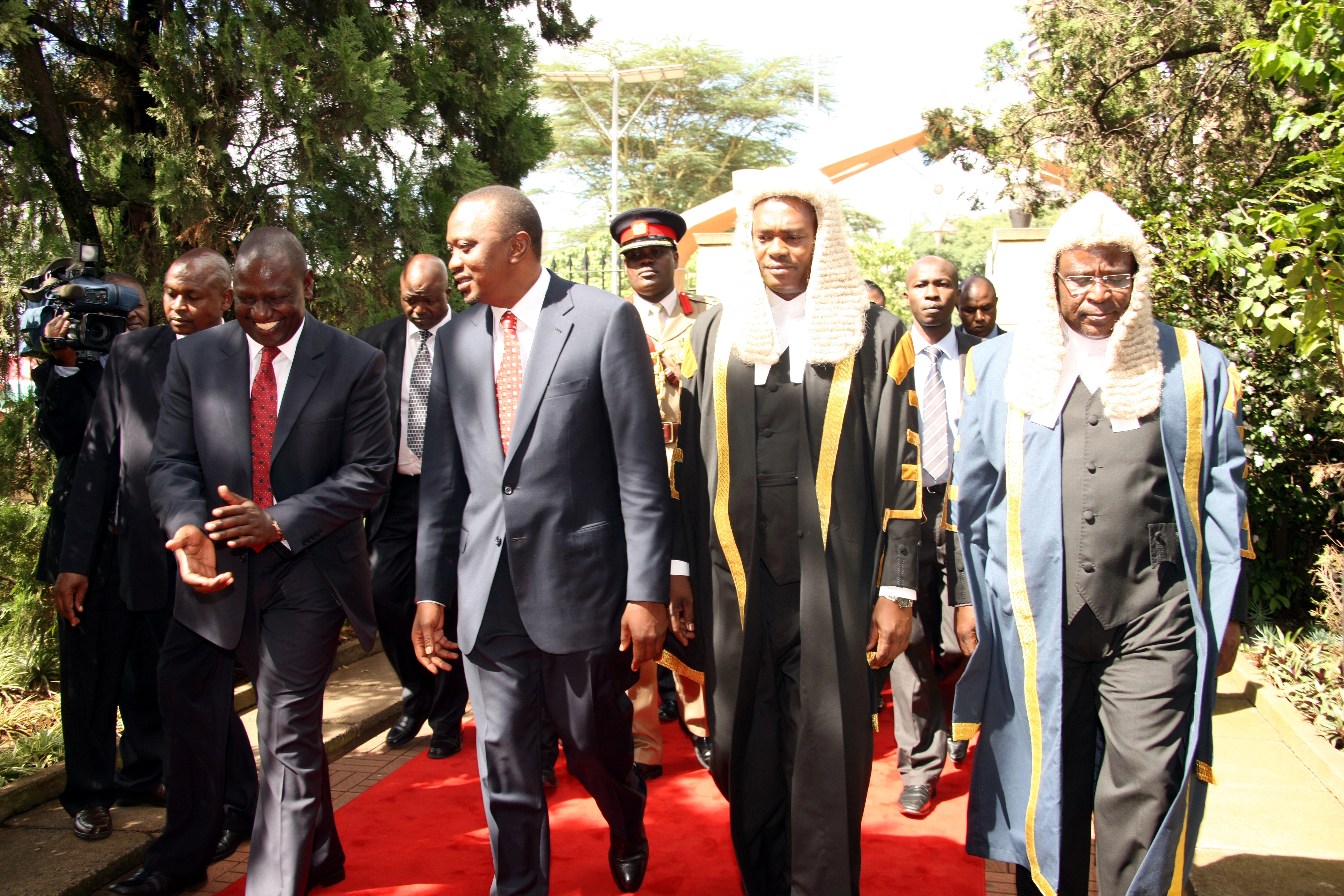 President Uhuru Kenyatta and DP William Ruto walking alongside House Speakers Justin Muturi and Ekwe Ethuro Parliament Buildings in Nairobi