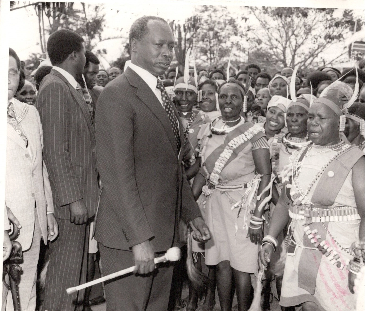 President Daniel Arap Moi entertained by traditional dancers after addressing Wananchi at the Ruringu stadium in Nyeri_22.10.1978